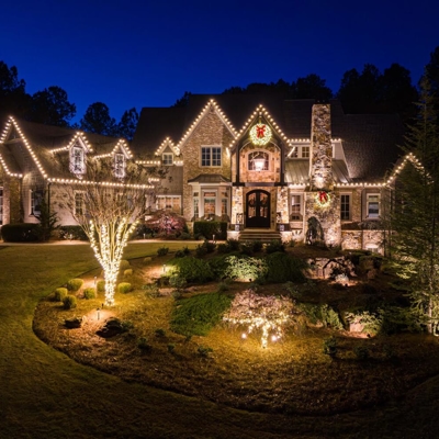 Beautiful holiday lighting on a home in Suwanee, GA Photo